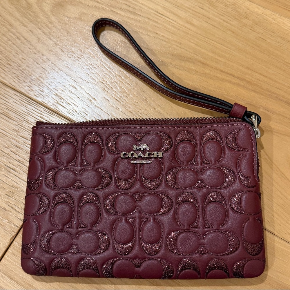Coach Glittery Wine Colored Embossed Wristlet